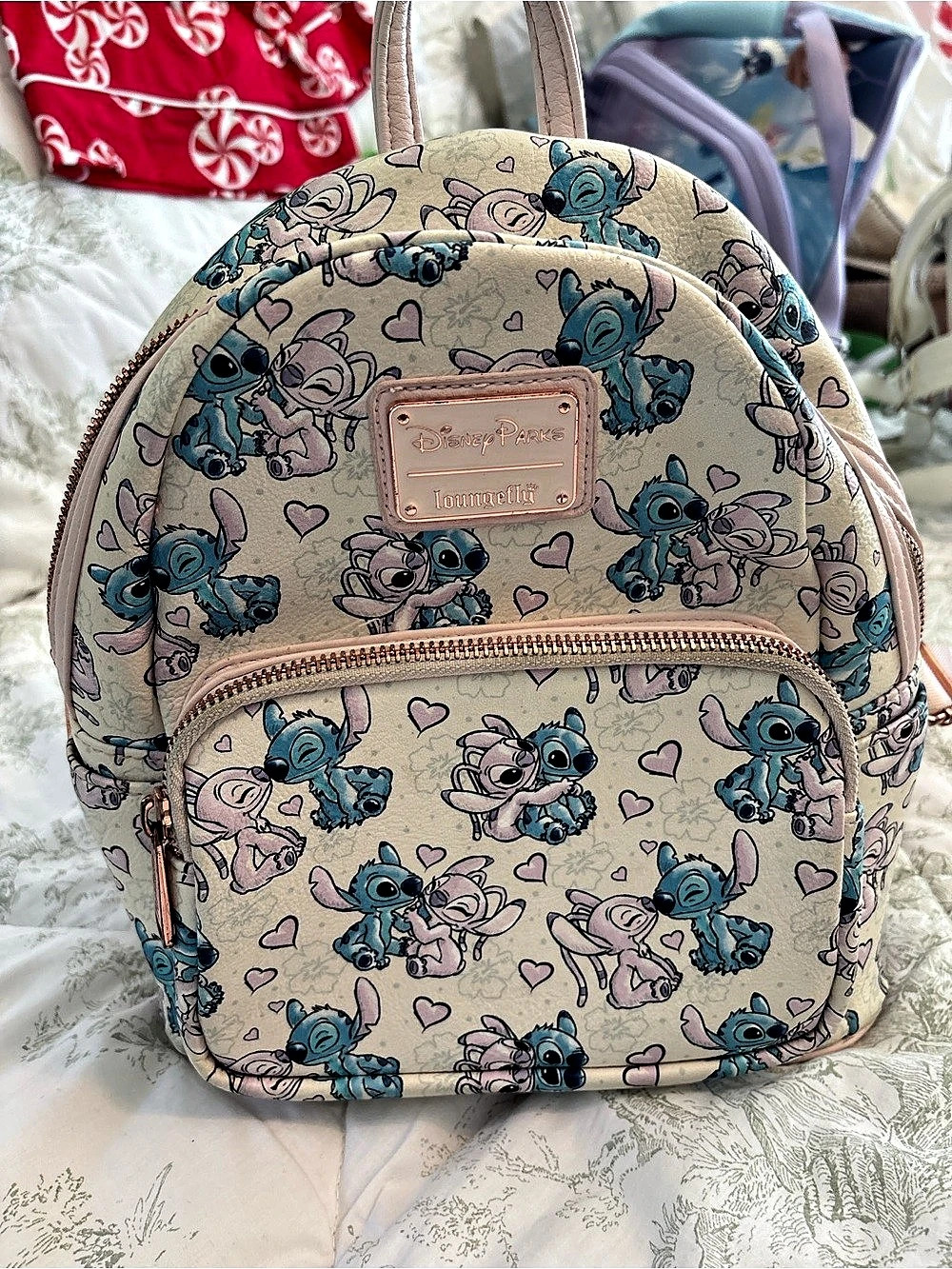 Loungefly Disney Parks x Loungefly Stitch & Angel AOP Mini Backpack Stitch &